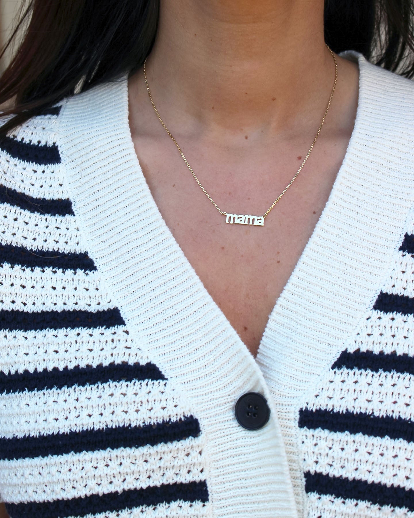 a close up of a person wearing a tie 