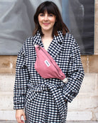a woman wearing a tie and a dress shirt 